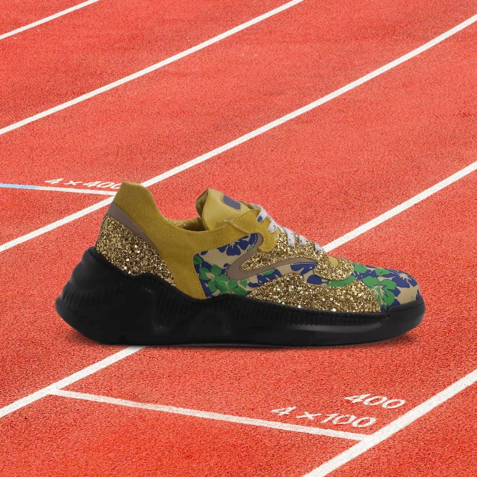 GabortronTV sneaker on red running track